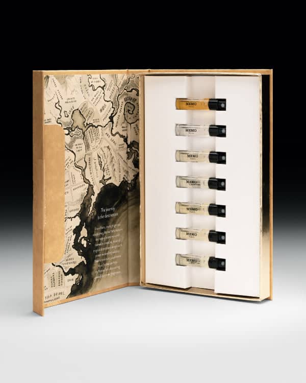 Gold-toned book-shaped box containing six memo perfume vials.