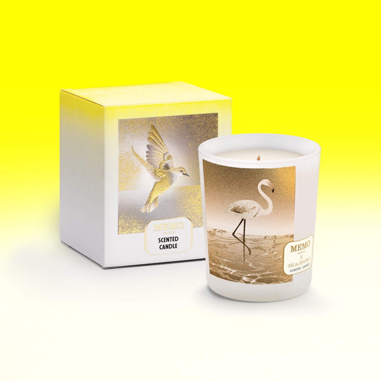White frosted glass candle with gold foil flamingo design and memo paris branding labeled sal de menorca